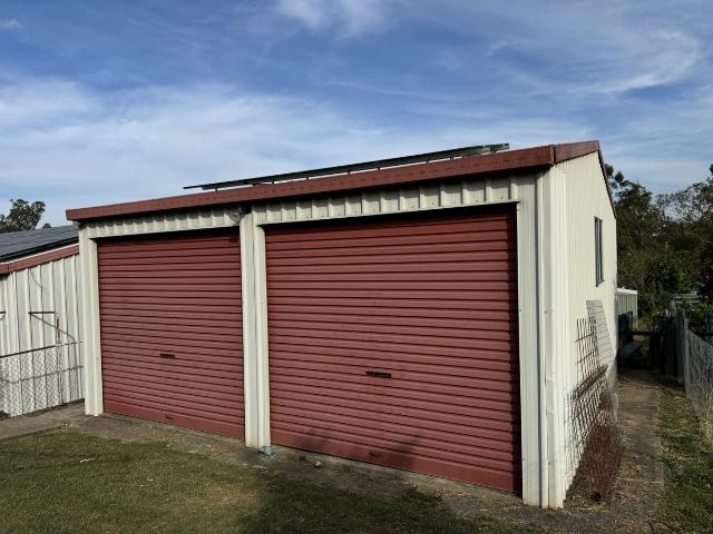 Large Family Home with 2 x Sheds!