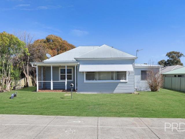 Large Family Home on a Rare Double Sized Block with Powered Sheds & Rear Lane Access