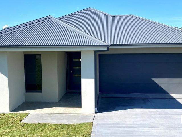 Large Four Bedroom Home in Huntlee