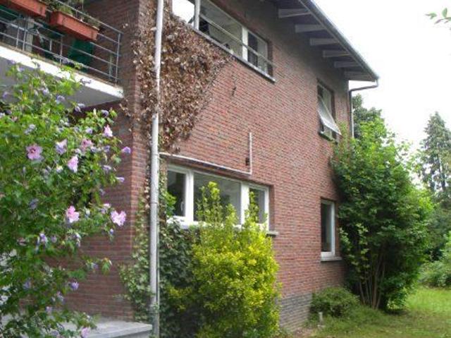 Large ground floor apartment with garden, cellar, and garage
