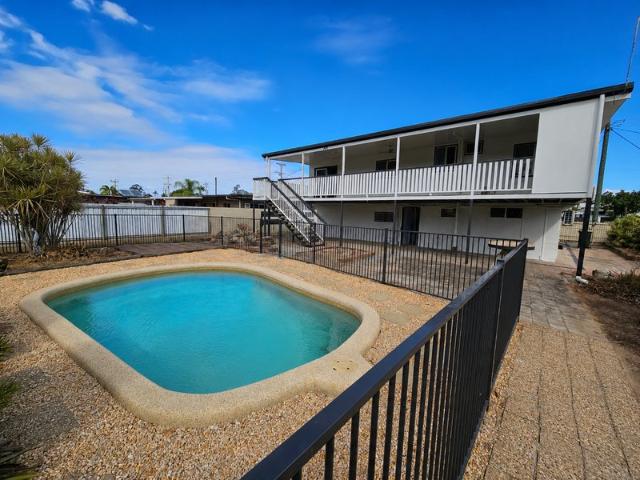 Large Highset Home With In Ground Swimming Pool