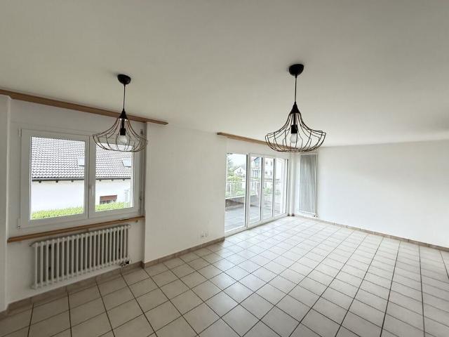 Large living room with spacious balcony