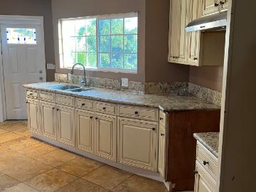 LARGE Lot Nearly half acre. Perfect for animals or gardening. Updated interior, New Gas Range, Detached garage, Washer/dryer hook up. Won't last!