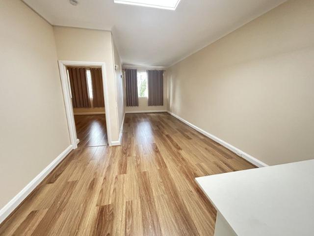Large Modern One Bedroom Apartment With New Flooring Throughout Close to Shops & Transport