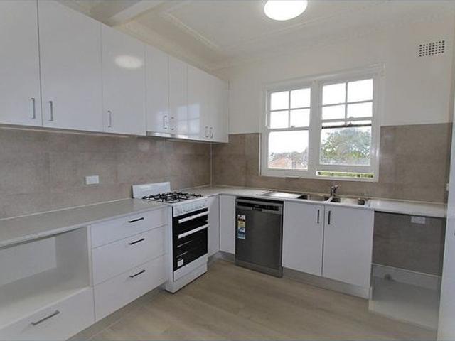 Large renovated two bedroom unit with sunroom