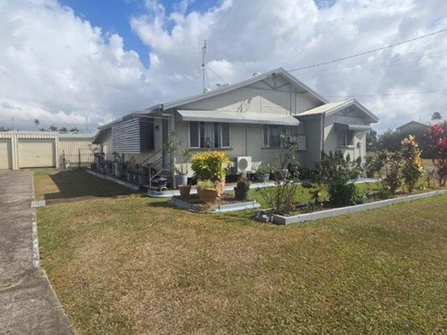 LARGELY RENOVATED CORNER BLOCK HOME WITH EXTENSIVE ENTERTAINING!