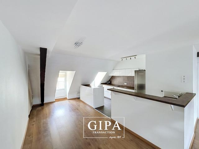 Le charme de l'ancien au sommet: duplex avec terrasse à l'Orangerie