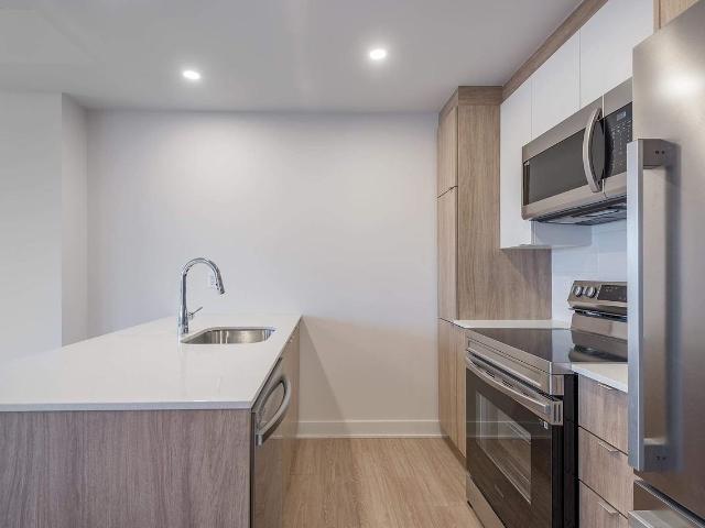 Le Must Tour 1 2 Bedroom Apartment for Rent at 365 Av George V, Montréal, QC H8S 4L3 Lachine