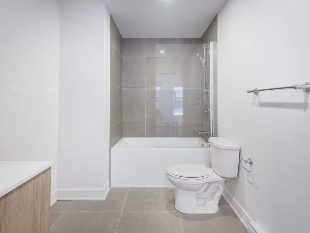 Le Must Tour 2 2 Bedroom Apartment for Rent at 65 Rue William Macdonald, Montréal, QC H8S 1Z6 Lachine