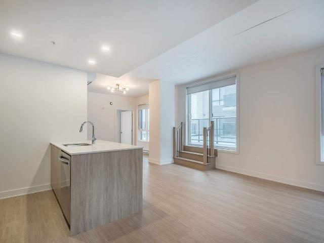 Le Must Tour 2 2 Bedroom Apartment for Rent at 65 Rue William Macdonald, Montréal, QC H8S 1Z6 Lachine