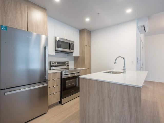 Le Must Tour 2 3 Bedroom Apartment for Rent at 65 Rue William Macdonald, Montréal, QC H8S 1Z6 Lachine