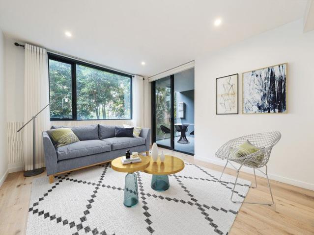 Leafy north facing living with a peaceful rear setting