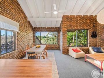 Elevated Top Floor Apartment