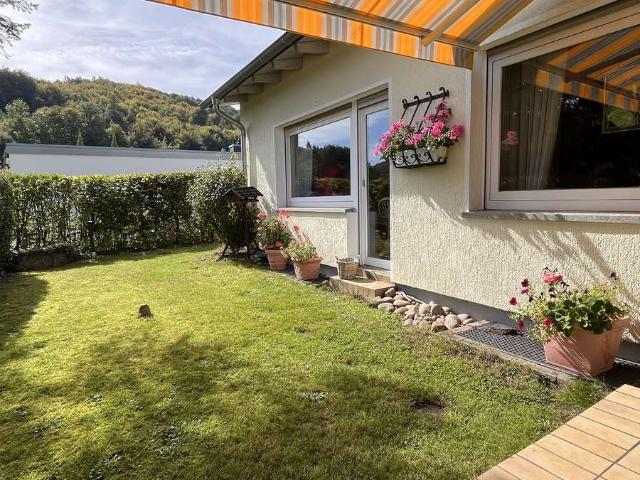 Lebendiger Wohnraum: Gepflegter Bungalow in Saarbrücken Scheidt