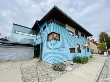 Lebensqualität pur: Gartenwohnung im EG mit 4 Zimmern, Terrasse & Garage