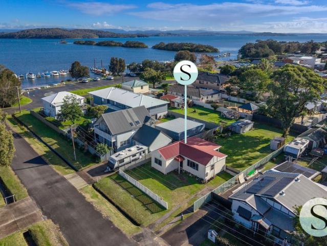 Less than 100m to The Lake Jetty, Moorings & Boat Ramp! Almost 700m2 of North Facing Flat Land, Tenant Keen to Stay Until You Renovate or Detonate!