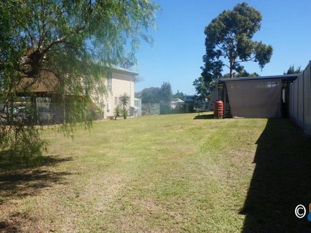 LEVEL BLOCK WITH CARAVAN & CLOSE PROXIMITY TO LAKE VICTORIA & MARINA