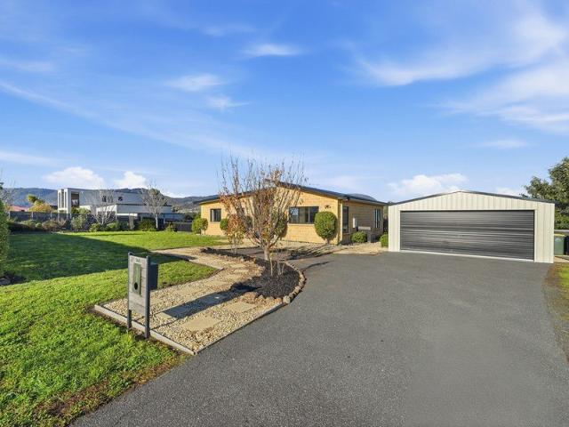 Level, double glazed, spacious, large garage, move straight in !