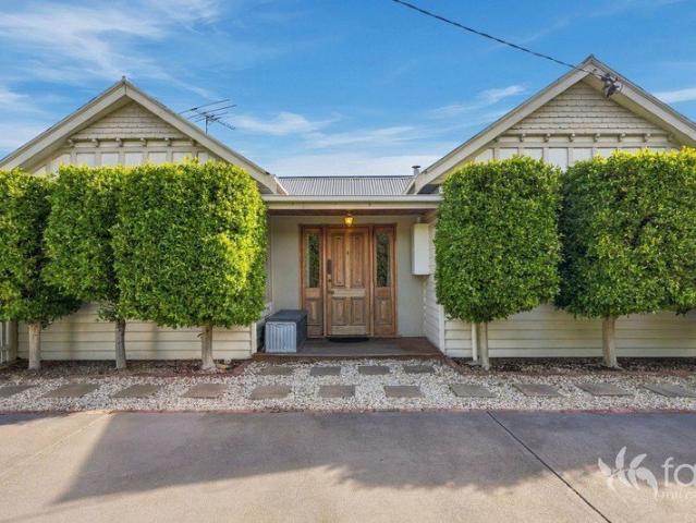 Level Family Home with Character and Location!