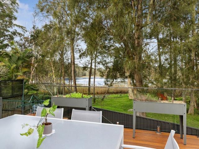 Level living on lakefront reserve