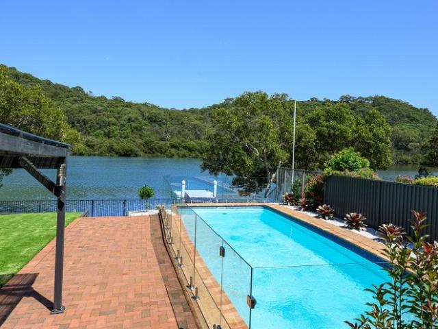 Level street to waterfront sanctuary located in Bonnet Bay's number 1 street, offering a holiday lifestyle all year round