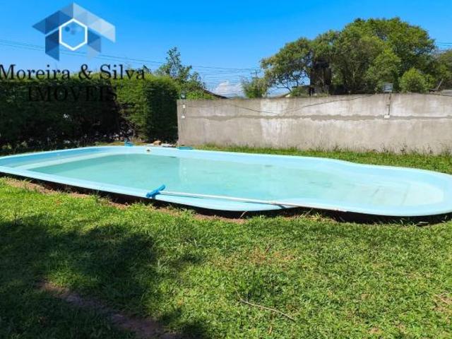 Linda Casa de Frente para a RS 040 com Piscina – Águas Claras, Viamão/RS