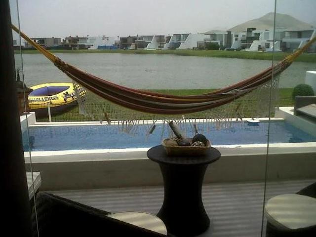 Linda casa de playa en condominio