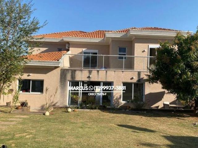 Linda casa em cond. fechado c/ 489m² de a/c e 720m² de terreno 3 suítes/ 3 vgs. FL23