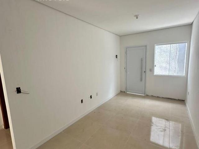 Linda casa em condomínio, à venda no bairro City Cachoeirinha/RS