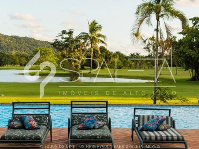 Lindíssima residência com golfe no quintal e vista sensacional para o lago à venda no Guarujá Golf C