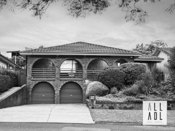 Linear Park and Tree Lined Streets Lead to this Magnificent Family Home