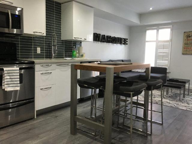 Liberty Village Toronto Furnished Townhouse Rental by King and Strachan Modern 1 Bedroom with 1 Bathroom plus Den and Spacious Layout
