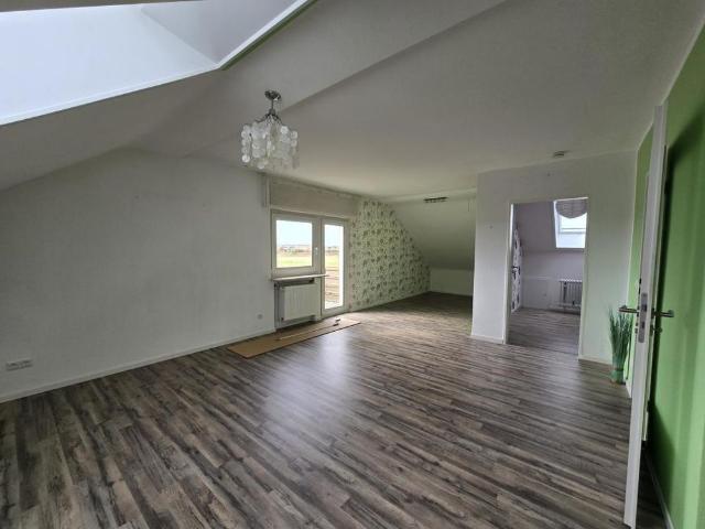 Lichtdurchflutete 1 Zi. Dachgeschosswohnung mit Balkon