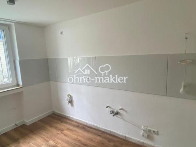 Lichtdurchflutete, 2 Zimmer Wohnung mit traumhaftem Wintergarten & Gartenzugang in D Lohausen