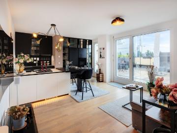 Light flooded 2 room apartment with large roof terrace