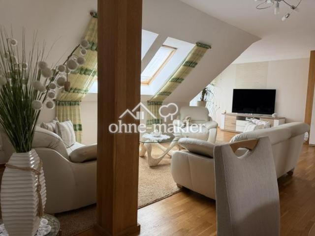 Lichtdurchflutete 2 Zimmer Dachgeschosswohnung mit separatem Dachboden in Luckau