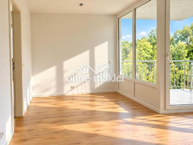Lichtdurchflutete 2,5 Zimmer Wohnung mit Loggia und Blick ins Grüne