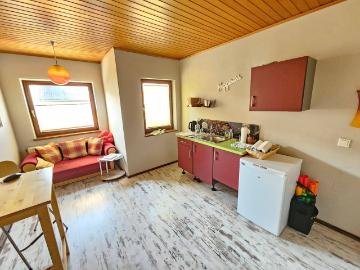 Lichtdurchflutete 3 Zimmer Wohnung mit separtem Eingang und Eigengarten in ruhiger Siedlungslage