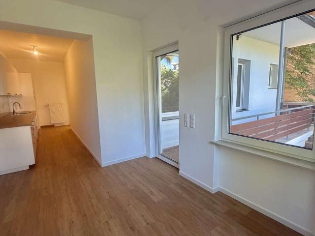 Lichtdurchflutete Wohnung mit großer Terrasse zum Garten – Erstbezug nach Vollsanierung