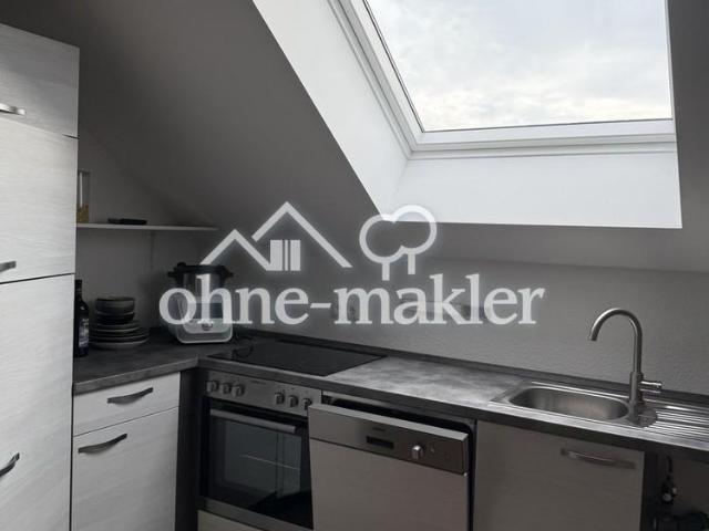 Lichtdurchflutete Dachgeschosswohnung mit Balkon und Aufzug
