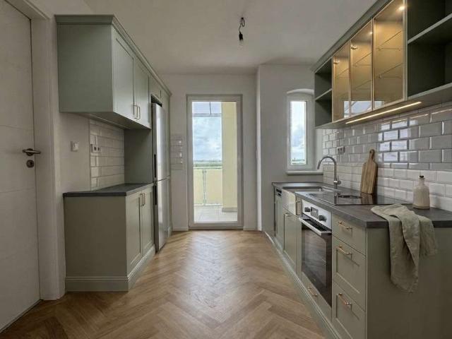 Lichtdurchflutete Galeriewohnung mit Dachterrasse und Aufzug