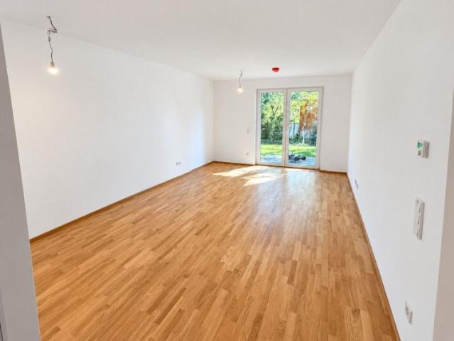 Lichtdurchflutete Gartenwohnung im Erstbezug mit Terrasse mit hoher Ausstattungsqualität