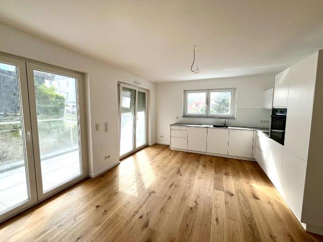 Lichtdurchflutete Neubau Wohnung mit Balkon in idyllischer Lage in Neu Anspach | Erstbezug