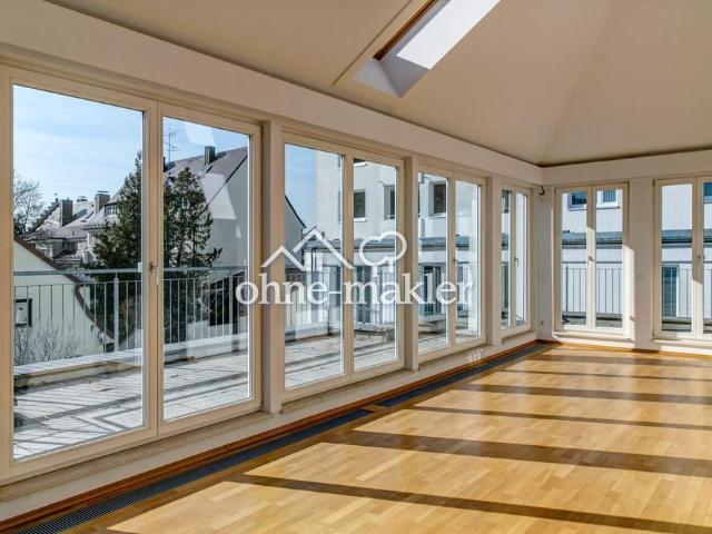 Lichtdurchflutete Penthouse Wohnung mit Dachterrasse unweit der Münchener City
