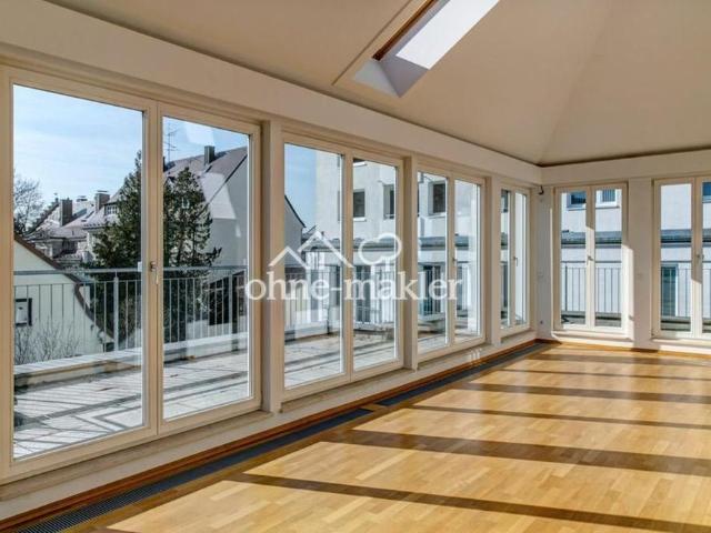 Lichtdurchflutete Penthouse Wohnung mit Dachterrasse unweit der Münchener City