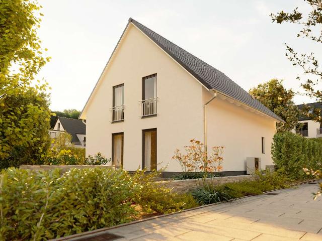 Lichtdurchflutete Räume treffen auf gemütliches Familienleben