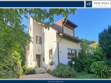 Lichtdurchflutetes Einfamilienhaus mit sonniger Terrasse und Garten in zentraler Wohnlage
