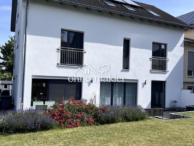 Lichtdurchflutetes Familienidyll mit Südgarten in ruhiger Lage
