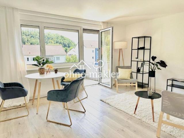 Lichtdurchflutetes Wohnglück mit Flussblick: 3 Zimmer Wohnung mit 2 Balkonen und Garage