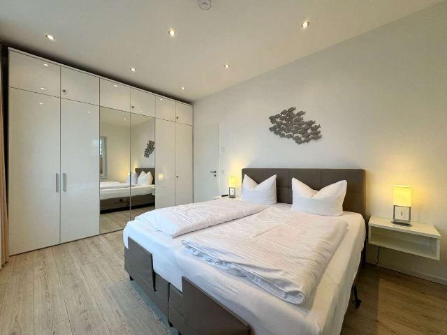 Lichterfüllte Ferienwohnung mit Panorama Dachterrasse und Strandflair